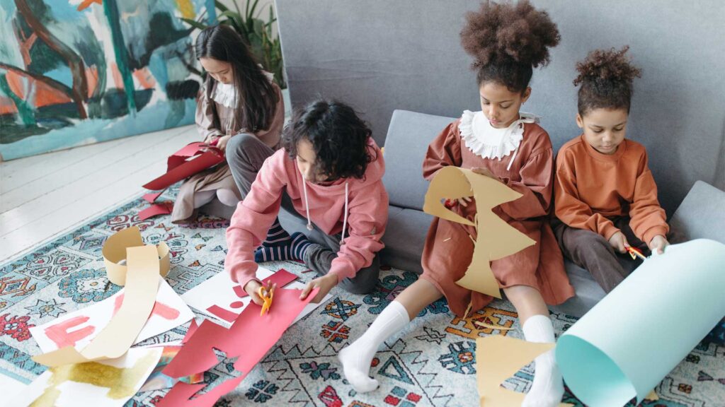 children doing paper crafts